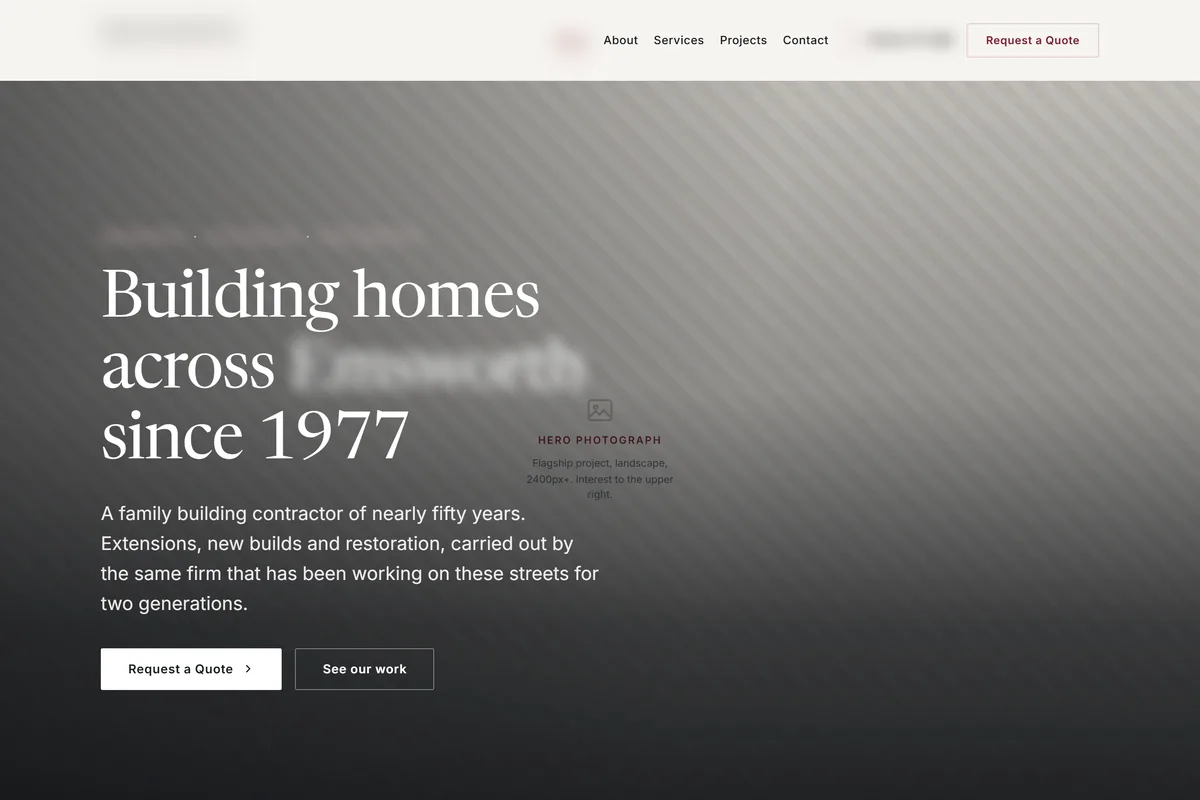Home page of an anonymised client build. The trading name, telephone number and town are blurred out.